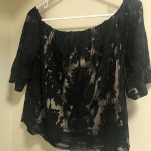 off the shoulder black floral shirt
